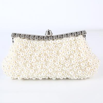 China Wedding New Style Bride Pearl Women Grab Bag Evening Handbag Fashion China Women Grab Jewelry Bag With Metal Frame Strap for sale