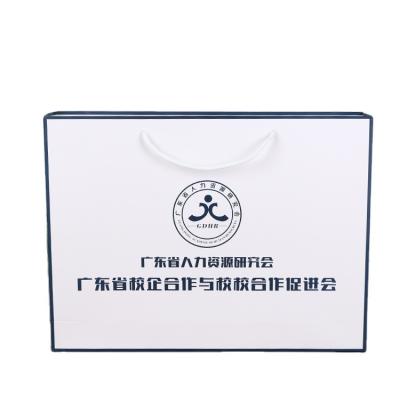 China Simple Edges Design Recyclable Dark Blue Printed Paper Bag for sale