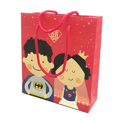 China Recycled Materials Fashion Custom Printing Clothes Dress Gift Bags Pink Cardboard Paper Tote Bag With Ribbon for sale