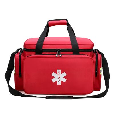 China Custom Waterproof Red Bag Kit Ambulance First Aid Bag Tactical Medical First Aid Appliance Emergency Trauma Bag Large Te koop