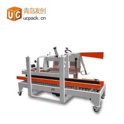 China Food Tissue Paper Boxes Top And Bottom Sealer Machine for sale