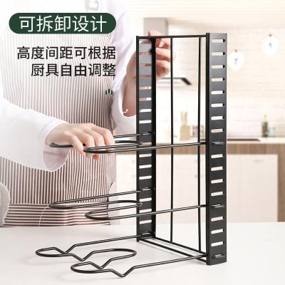 China Multi-function creative multi-functional vertical iron cover frame pot storage kitchen folding layer pot frame for sale