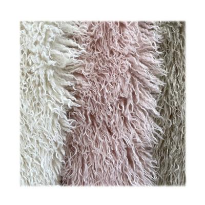 China Custom luxury faux fur mongolianfur sheepskin curve 60mm cashmere wool auto garment fabric faux long fur for fashion garment for sale