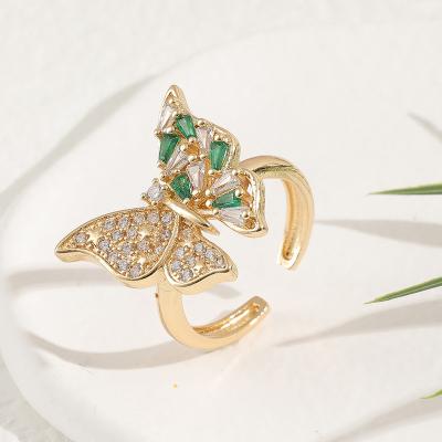 China Low MOQ Fashionable Luxury Jewelry Ring Tail Ring For Women Summer Butterfly Open Hand Open Diamond Popular Green Zircon Ring for sale