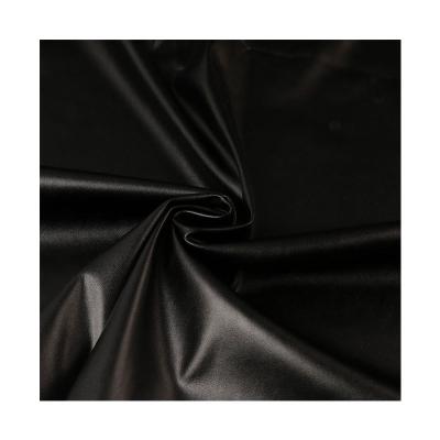 China Popular Marimekko Elastic Weight 220-240gsm Width 55 Inch Thickness 0.5MM 60% PU Faux Elasticity Leather With 40% Polyester Fa Coupling for sale