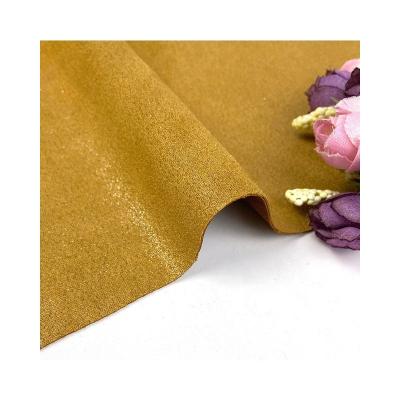 China Cheap Stock Brushed Sueded 95% Polyester 5% Spandex Tan Scuba Suede Knitting Fabric Tanned Stretch Knitted Fabric for sale