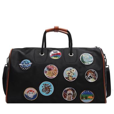 China 2020 New Fashion Embroidered Badge Decoration Travel Duffle Bag Large Capacity Weekend Duffel Bag for sale