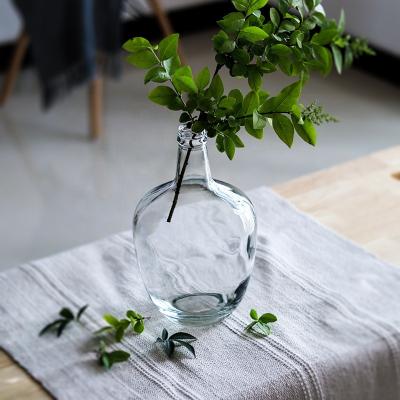 China Fashionable Bud Glass Vase 2021 Minimalist Hand Transparent Vase Large Modern Irregular Vase Clear Decorative Big Bellied Nordic Swollen for sale