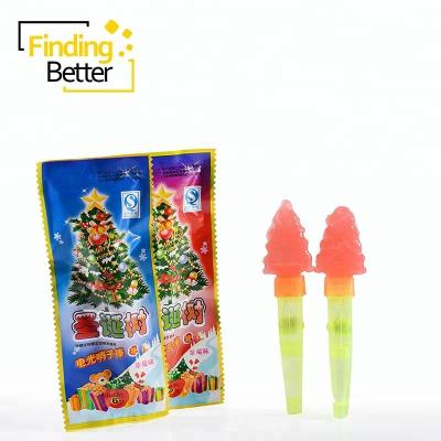 China Best Natural Selling Candy Toy Lighting Christmas Tree Shaped Candy Lollipop Tree Light Stick Lollipop Pipe Soft Candy Lollipop for sale