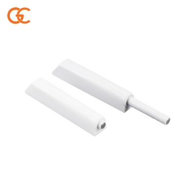 China Gray Color Cabinet Door Rebound Push Open System Plastic Door Latch Device White Cabinet Bounce Buffer Door Latch for sale