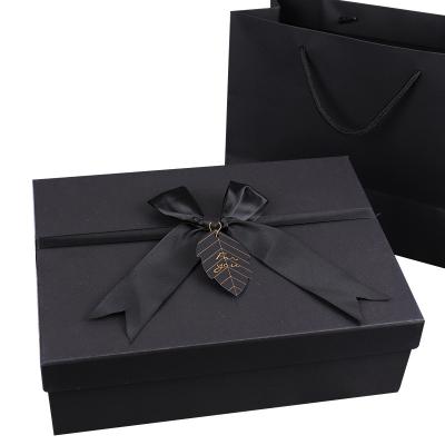 China Wholesale Biodegradable Black Gift Paper Lid Box With White Bow And Bag Tie For Wedding Favors Clothing Dress Cosmetic Gift Ready To Ship for sale