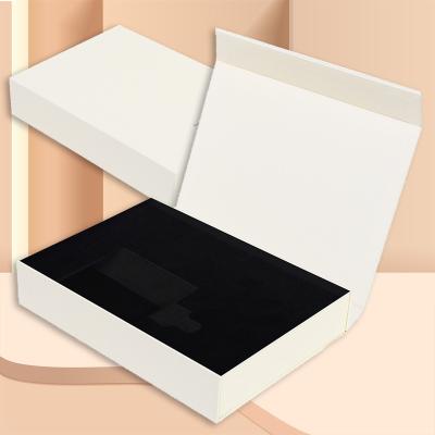 China Custom Recycled Materials Logo Gift White Box For Essence Oil Tube Cosmetic Perfume Bottle Eye Luxury Magnetic Box With Foam Inserts for sale