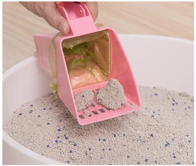 China Sustainable pet waste disposal comes with one-in-one waste bag convenient waste shovel plastic toilet collection cat litter scoop for sale