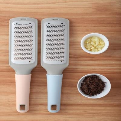 China Pro Multifunctional Zester Grater Sustainable Kitchen Instruments For Vegetable Butter Etc Ergonomic Soft Handle Plastic fruit chocolate for sale