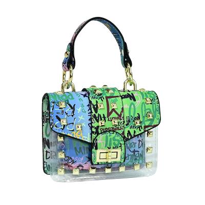 China Hot Selling Lady PVC Graffiti Rivet Bag Designer Shoulder Bag Designer Transparent Rivet Bag Purse Purse for sale