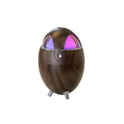 China 2022 New Eggshell Wooden Grain Humidifier Mini USB Ambient Light Home Office Colorful Night Light Quiet Sprayer for sale