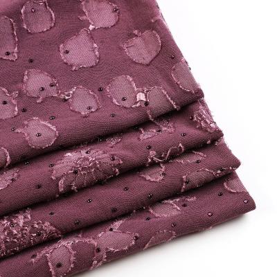 China Heat-insulation bulk sale customized 100 150cm dyed polyester jacquard knit fabric for dress for sale