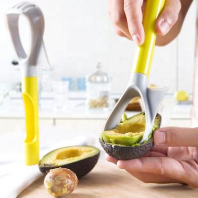 China Viable 5 in 1 Kitchen Instruments Fruit Tool Avocado Slicer for sale