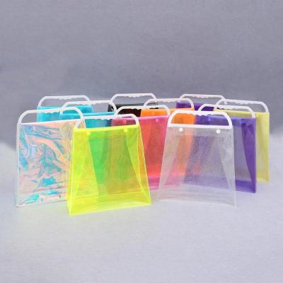 China Custom Clear PVC Handled Makeup Shopping Bag for sale