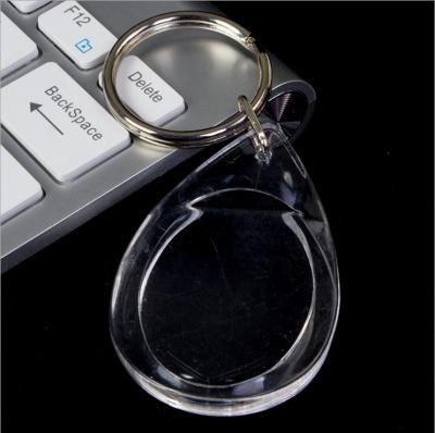 China Festival Around Clear Plastic Acrylic Photo Insert Key Chain for sale