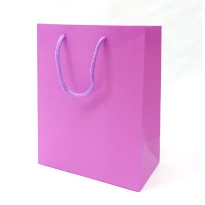 China Biodegradable Custom Logo Luxury Brand Gift Boutique Creatrust Handle Kraft Paper White Paper Bags With Your Own Logo for sale