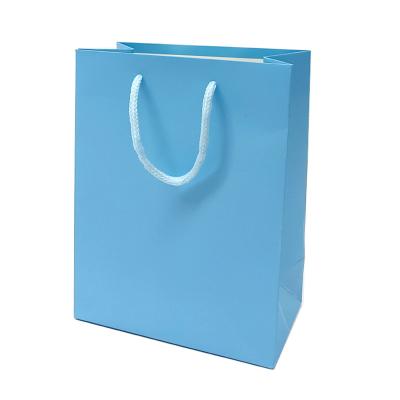 China Recyclable Custom Print Logo Gift White Paper Shopping Bags Kraft Brown Packaging Paper Bags for sale