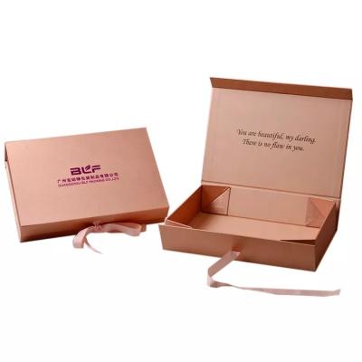 China Recyclable Rigid cardboard gift boxes with ribbon and magnetic lid gift packaging flat packing folding box for clothes shoe and handbags for sale