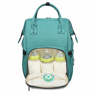 China With USB Custom Raincoat 3 in 1 Travel USB Baby Changing Diaper Bag Premium Left Backpack with a Pacifier Bag for sale