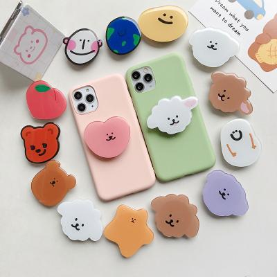 China Wholesale High Quality Custom Logo Cell Phone Acrylic Epoxy Holder Waterproof With Cute Design Phone Plug Customized Acrylic Stand for sale