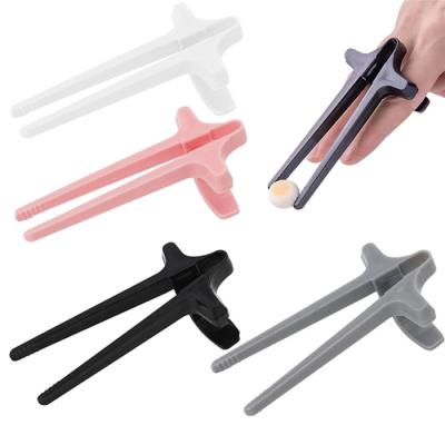 China New Novelty Artifact Games Props Multicolor Lazy Undirty Finger Snackpick Hand Finger Game Chopsticks for sale