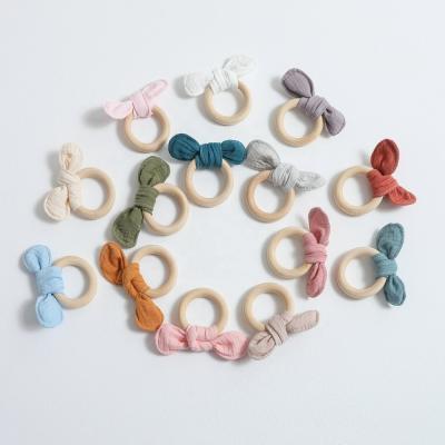 China Cute Handmade Cute Rabbit Ear Chain Baby Gym Pacifier Ring Wooden Teethers Teethers for sale