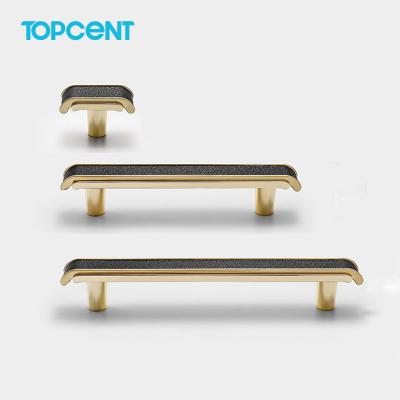 China Topcent Modern Leather Cabinet Knobs and Handles Gold Metal Kitchen Cupboard Drawer Pulls Handles for sale