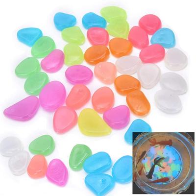 China Viable Aquarium Accessories Luminous Pebble Stones Glow In The Dark For Aquarium Landscaping for sale