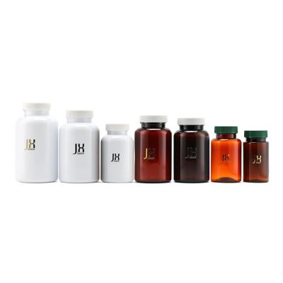 China Medicine Custom 100 150 200 250 300 400ml Pet Plastic Packaging Vitamin Pill Capsule Medical Amber Bottle With Induction Heat Seal for sale