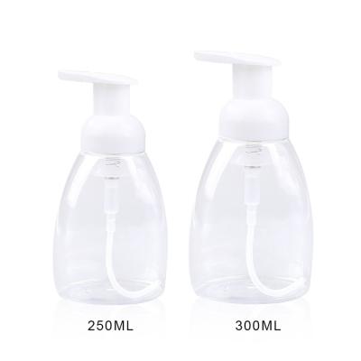 China Amber 250ml 300ml Cosmetic Empty Clear Green Triangle Shape Plastic Foaming Soap Pump Bottle for sale