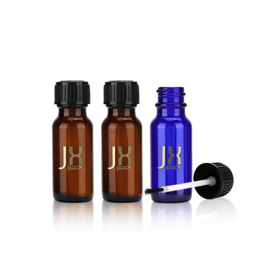 China 5ml 15ml 30ml 50ml 60ml Round Boston Glass Bottle Cosmetic Amber Essential Oil Glass Bottle With Brush for sale