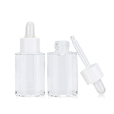 China Cosmetic Cylinder 50ml 1.7oz Empty Transparent Cosmetic Glass Serum Essential Oil Dropper Bottle for sale