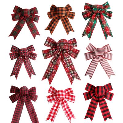 China 2023 Hot Selling 100% Polyester Cable Edge Christmas Snowflake Bows Large 26*32cm Christmas Bows Grig Tie For Decoration for sale