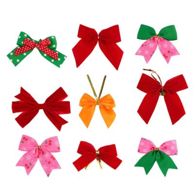 China Hot Selling 100% Polyester Customized Cable Edge Christmas Snowflake Hangers Large 26*32cm Christmas Bows Grig Tie For Decoration for sale