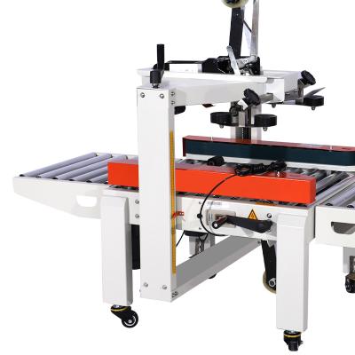 China Semi Automatic Food Box Flap Folding Sealing Machine FXC5050 for sale