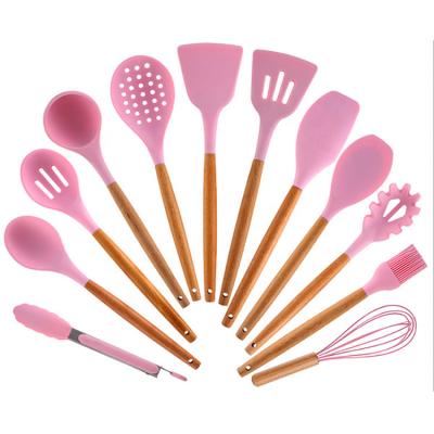 China Viable Wholesale Kitchen Accessories Custom 12 Pcs Silicone Heat Resistant Utensils Set Wooden Handle Cooking Kitchen Tools for sale