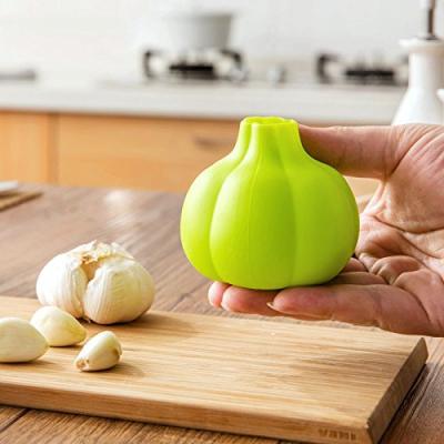 China Sustainable Amazon Selling Silicone Garlic Peeler /garlic Hot Press for sale