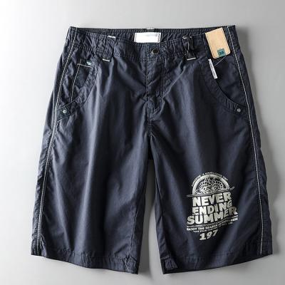 China Custom Casual Solid QUICK DRY Printing Waterproof Elastic Waistband Pockets Cargo Mens Shorts for sale