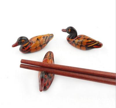 China Duck Chopsticks Rest Rack Ceramic Chopstick Holder Eco-Friendly Sustainable Bamboo Holder for sale