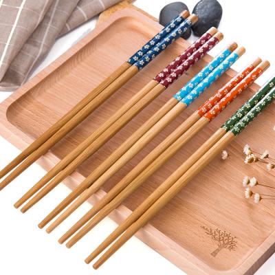 China Custom Environmental High Quality Viable Cherry Pattern Bamboo Reusable Wooden Chopsticks for sale