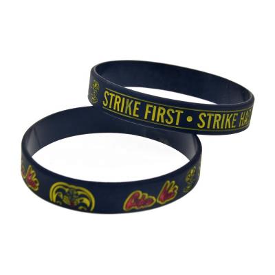 China 50PCS Hiphop Strike Hard Strike First No Mercy Silicone Rubber Bracelet Black for sale