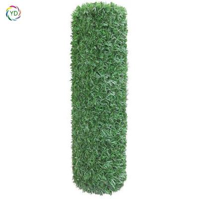 China Ultraviolet-proof High Quality Outdoor Artificial PVC Film Fence Green Leaf Artificial Grass Fence for sale