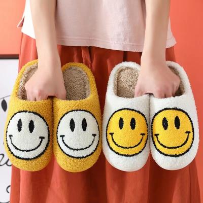 China Cute Plush Toy Happy Smiley Face Fur Anti-Smell Winter Cardboard Bedroom Smile Face Slips Women Ladies Slippers for sale