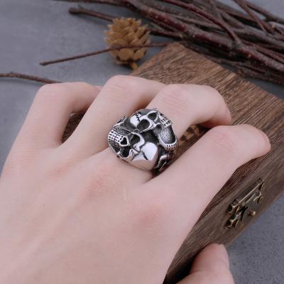 China Wholesale Stainless Steel Cool Men's Skull Ring Punk Rock Fashion Jewelry Metal Wind Three Sides Gift Punk for sale