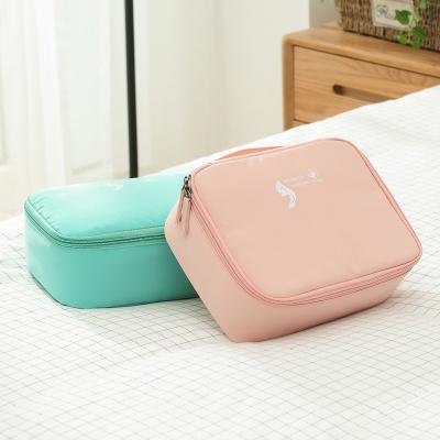 China Small Cubic Multicolor Cosmetic Pouch Cosmetic Wholesale Polyester Travel Handbag Toiletry Bag Small Square Bag for sale